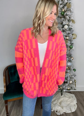 Noticed in Neon Checkered Cardigan in Pink and Orange